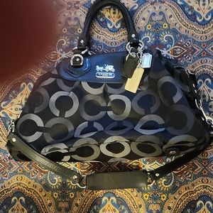 Black and grey Coack purse with silver hardware.